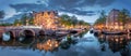 Amsterdam. Panoramic View Of The Historic City Center Of Amsterdam. Traditional Houses And Bridges Of Amsterdam. A Blue Evening