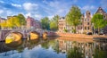 Amsterdam. Panoramic view of the historic city center of Amsterdam. Traditional houses and bridges of Amsterdam. An early quiet Royalty Free Stock Photo