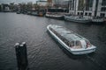 Amsterdam river tram with tourist sightseeing