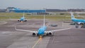 Amsterdam, Schiphol Airport. KLM Boeing 737 are moving to the runway Royalty Free Stock Photo