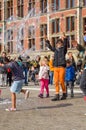 AMSTERDAM - SEPTEMBER 18, 2015: Woman making huge bubble balloon