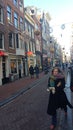 A woman walking in Amsterdam street