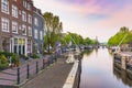 Amsterdam streets, canals during dusk on the Sint Antoniesluis Royalty Free Stock Photo