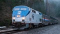 Amtrak Empire Builder in the rainy Washington Cascades at nightfall