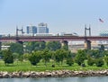 The Amtrak Acela Express heads north on elevated tracks over Randall`s Island in in NYC