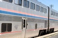 Amtrak passenger train sleeping car alongside platform Royalty Free Stock Photo