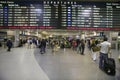 Amtrak train travelers stand in line under Departures sign at Penn Station, New York City, Manhattan, New York Royalty Free Stock Photo