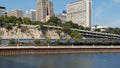 Amtrak train travels along river at St. Paul, Minnesota