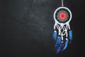 Amulet Dreamcatcher on a black background with free space protecting the sleeper from evil spirits Royalty Free Stock Photo