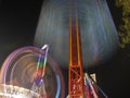 Amusement fair ride long exposure night photography Royalty Free Stock Photo