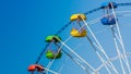 Amusement park attraction, Review from the Ferris wheel, children have fun Royalty Free Stock Photo