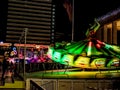 Amusement park colors lights atmosphere happy people crowd