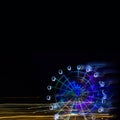 Amusement Park at night - Ferris wheel neon glow in motion with place under text