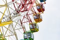 Amusement park observation wheel colored cabs Royalty Free Stock Photo