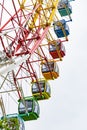 Amusement park observation wheel colored cabs Royalty Free Stock Photo