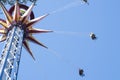 Amusement park. People having fun. Carnival swing ride.