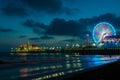 Amusement park on the pier in Santa Monica at night, Los Angeles, California, USA Royalty Free Stock Photo