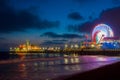 Amusement park on the pier in Santa Monica at night, Los Angeles, California, USA Royalty Free Stock Photo