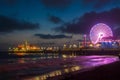 Amusement park on the pier in Santa Monica at night, Los Angeles, California, USA Royalty Free Stock Photo