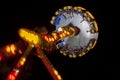 An amusement park ride spins in mid air at Antalya in Turkiye.