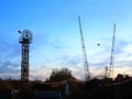 Slingshot ride in amusement park at the blue hour