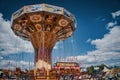 Amusement ride seat swing at a carnival Royalty Free Stock Photo