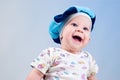 Amusing baby boy in a beret