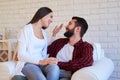 Amusing couple making merry over communicating, close-up shot