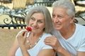 Amusing happy smiling old couple