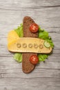 Amusing sandwich plane made on wooden table