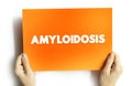 Amyloidosis is a disease that occurs when a protein called amyloid builds up in organs, text concept on card