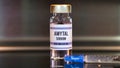 Amytal drug and syringe on black table