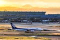 ANA Aircraft Boeing 737 on the runway of Haneda International Airport with Fuji mountain background, Japan