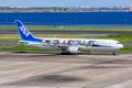 ANA All Nippon Airlines Boeing 767-300ER airplane at Tokyo Haneda Airport in Japan Demon Slayer special livery Royalty Free Stock Photo