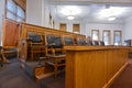 The jury box in a courtroom in the Deer Lodge County Courthouse, Anaconda, Montana, USA Royalty Free Stock Photo