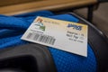 Anacortes, WA USA - circa November 2021: View of a Washington State Ferry ticket sitting on top of a blue suitcase