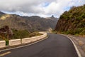 Anaga - Curvy remote car road and view on mountain Roque de Taborno in Anaga massif on Tenerife, Canary Islands, Spain Royalty Free Stock Photo