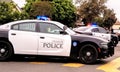 An Anaheim Black and White Police Cruiser Responding to a Crime Scene. Royalty Free Stock Photo