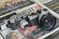Analog cameras on newspapers Royalty Free Stock Photo
