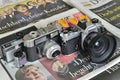 Analog cameras on newspapers Royalty Free Stock Photo