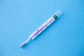 Analog mercury thermometer with 37,7 ÃÂ°C of temperature, fever, flu, corona virus, covid19