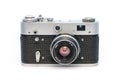 Analog soviet camera FED on white background. Old dusty retro film photographic equipment. Royalty Free Stock Photo