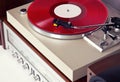 Analog Stereo Turntable Red Vinyl Record Player with Red Disk Royalty Free Stock Photo