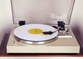 Analog Stereo Turntable Vinyl Record Player with White Disk Royalty Free Stock Photo