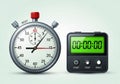An analog stopwatch and a digital timer are displayed side by side. The stopwatch Royalty Free Stock Photo