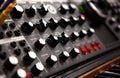 Analog synth device for electronic musical production. Professional audio equipment in sound recording studio