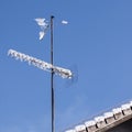 Analog tv antenna covered with snow