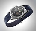 Analog wristwatch with digital touch screen, and blue leather wristband