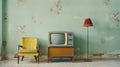 Analogue old vintage retro style TVset, yellow armchair, floor lamp near wallpaper wall art deco style living room. Media services Royalty Free Stock Photo