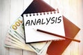 ANALYSIS text written on notebook with dollar bills and pencil Royalty Free Stock Photo